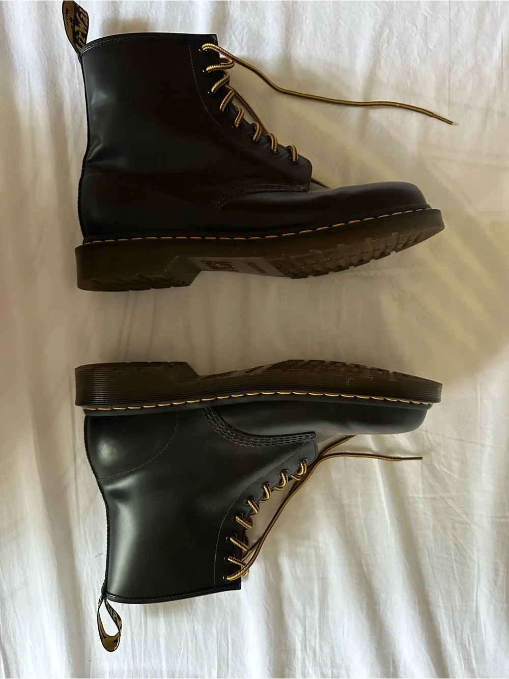 Dr. Martens Black Leather 8-Eye Boots with Yellow Accents